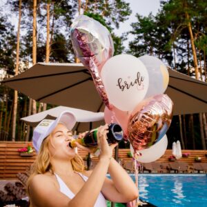 Woman at a pool party celebrates with champagne and balloons, perfect for bachelorette themes.